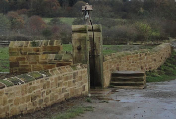 Photo 4  - 2015 St.Helens Church Opening - Gateway to Graveyard (with Wrought Iron Arch Supporting an Oil Lamp) - next to the Mounting Block.